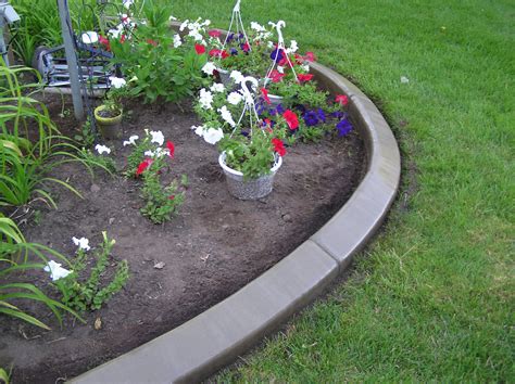We offer high quality concrete edging. CUSTOM CONCRETE CURBING | NoCo Coatings & Concrete LLC.