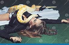 snake woman python model serpent hair crawl beauty sensual makeup face long preview