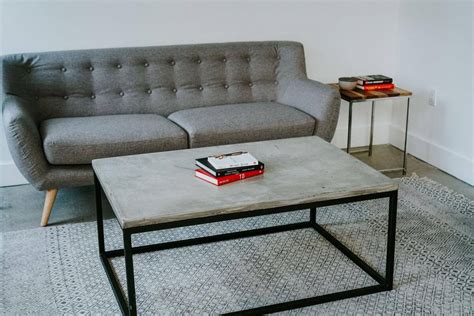 Learn how to put its raw texture to value into a beautiful rustic coffee table. DIY Modern Concrete Coffee Table - John Malecki