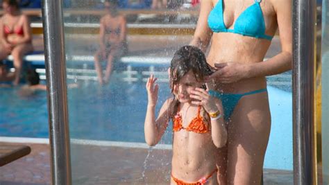 See more of how i met your mother on facebook. Nice Little Girl Washes Under Water In Shower Cabin Stock ...