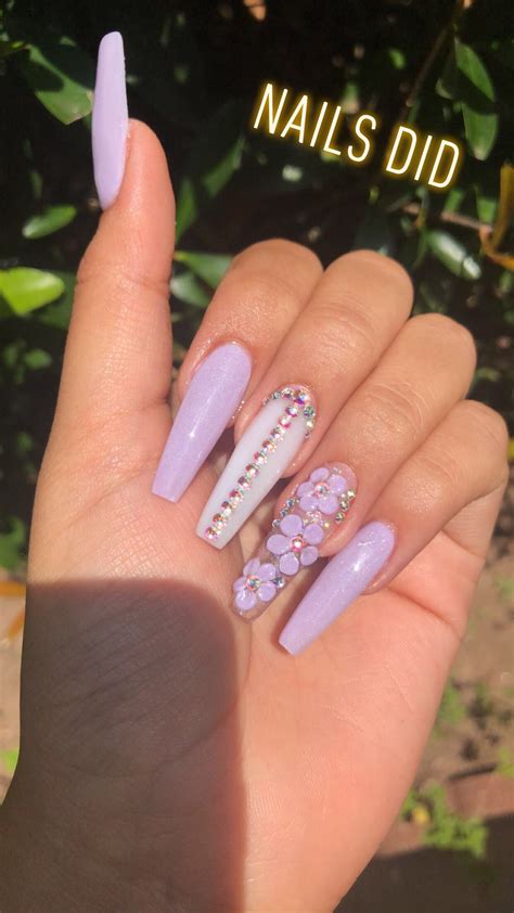 In nature usually dark colors will be dominant over the lighter colors. light purple with rhinestones and flowers | Purple acrylic ...