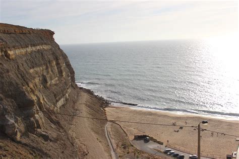 Praia da calada beach, also known as praia do porto da calada beach, has an extensive and wide sand with the shape of a seashell. A guide to some of the best beaches in Portugal