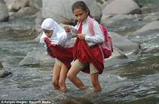 school river two schoolgirls heavy cross high celebrity training going just re they each other rains destroyed wait wire bridge