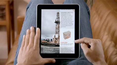 Kindle app is one of most advanced book readers in the itunes appstore. A user reading an e-magazine on iPad Source Apple. (2010 ...