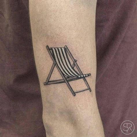 This is our second purchase of this exact chair for tattoo artist use. Fine line style beach chair tattoo on the upper arm ...