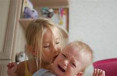 sister brother little crying storyblocks soothing older