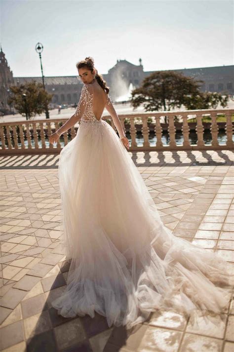 An overskirt wedding dress is a bridal gown that features a detachable skirt, which is typically removed after the ceremony. Berta 2018 F/W Wedding Dresses | ElegantWedding.ca