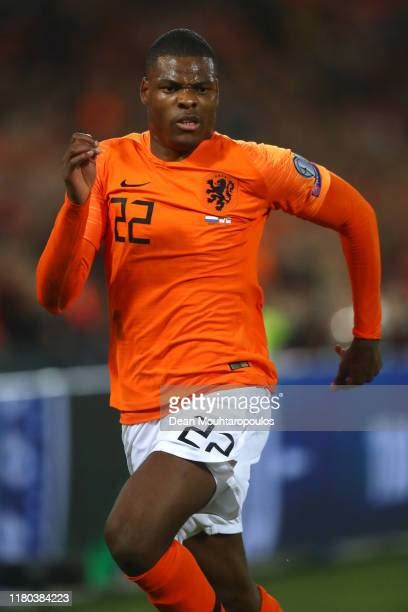 Wijnaldum double sets dutch on the way to win over bosnia. Denzel Dumfries Photos and Premium High Res Pictures ...