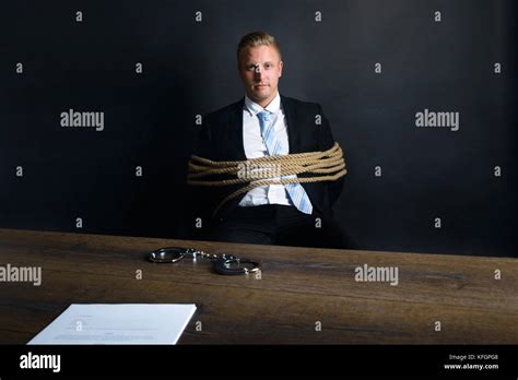 Man Tied To Chair Stock Photos & Man Tied To Chair Stock 
