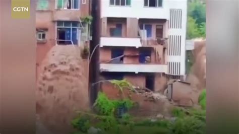 Wednesday 21 july 2021 18:56, uk. Flood water gushes through residential building in SW ...