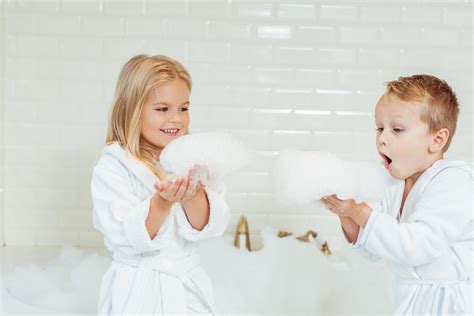 Bathtub child infant bathing bathroom, children bathtub, childrens clothing, kitchen, furniture png. Kids Playing In Bathtub With Foam Stock Photo - Download ...