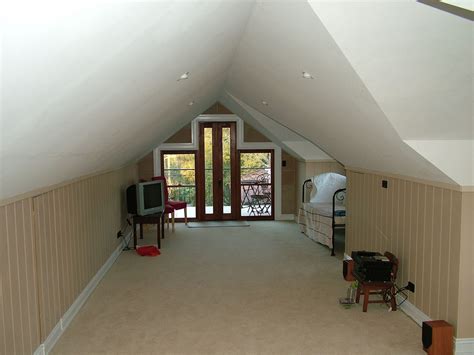 This is a structural extension which projects vertically from the slope of the existing roof, creating a box shape. Lifestyle Home Designs | Garage Conversion & Loft