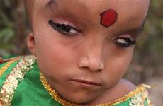 indian boy hindu believe reincarnation god india villagers pranshu photographed verma barcroft ajay camera looks while being into eyes old