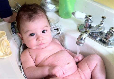 And when you're taking a bath with your baby, keep both hands on her at all times. The Healthy Family Chronicles: Weston's sink bath