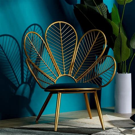 These lovely and functional creative chair are available at enticing offers and discounts. nordic modren peacock shape living room chair sofa chair wrought iron ins chair Leisure ...