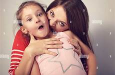mother emotional capricious angry bite wanting naughty alamy young her