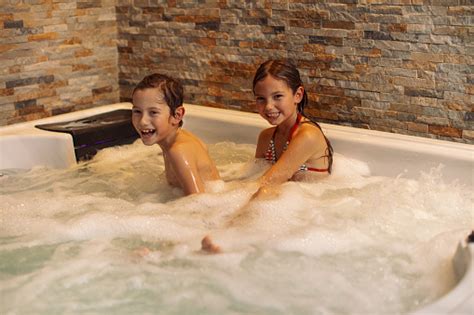 It's a great tool to get your child to experts recommend using a sturdy, hard plastic child bathtub. Children Having A Fun In Hot Tub Bath Stock Photo ...