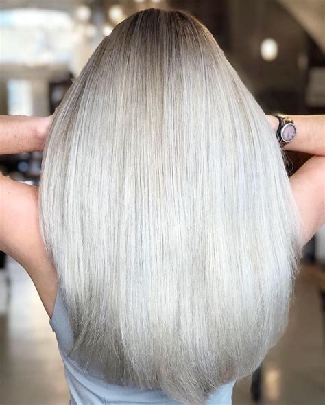 Pearl blonde done by @kristenclark.hair. 5 REASONS TO GO SCANDI BLONDE - Live True London Salons