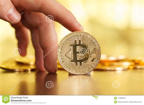 Bitcoin has just hit a record high and is poised to rise even further. Bitcoin - Currency Of The Future Stock Photo - Image of ...