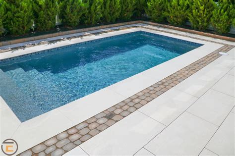 Eco stone porcelain pavers are the ideal paver choice for your swimming pool area. Beautiful alpine #porcelain #paver by the #pool! # ...