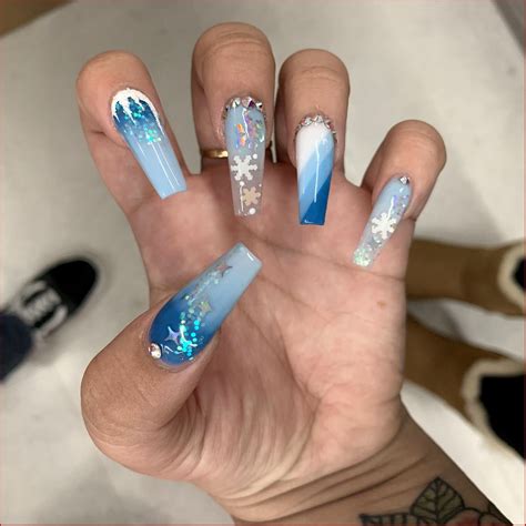 Winter wonderland blue long acrylic nails | Long acrylic nails, Winter nails acrylic, Acrylic nails