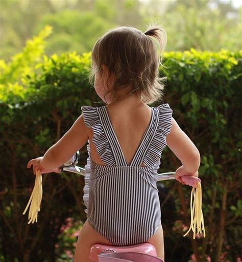 You can give a tub bath once the umbilical cord has fallen off and the stump has healed. Toddler bathing suit (With images) | Toddler bathing suits ...