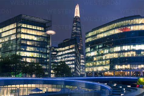 Finance officer salaries in london. UK, London, office buildings at financial district by ...