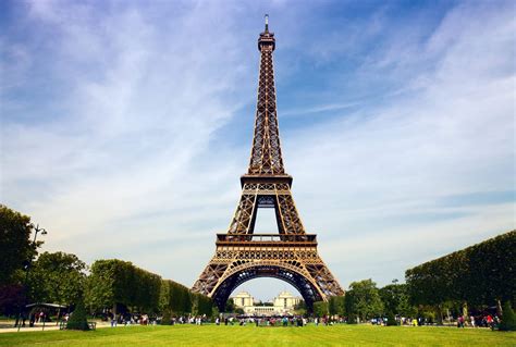 The intricate lattice work and draws millions of tourists every year. Eiffel Tower Cultural Icon of Paris, France | Found The World