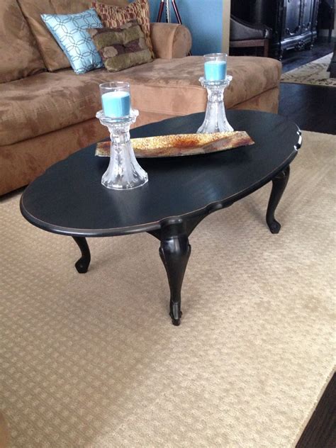 I love the queen anne style tables! Queen Anne Style Coffee Table...refinished in black with light distressing. Purchased online ...