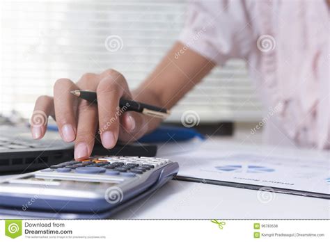 This document is provided for information purposes only. Businesswoman Calculate About Cost And Doing Finance At ...