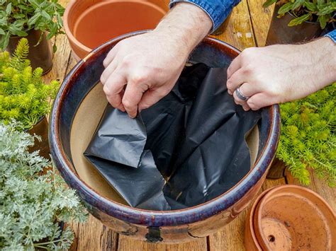 Preparing flowerbed soil for planting written. Preparing Flower Pots for Planting | HGTV