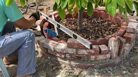 When you have limited yard space due to city living like we do, you may look for any spot available to brighten up the yard and plant flowers. How to build brick tree ring and a big mistake - YouTube