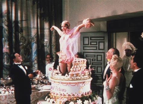 'umm, you mean where the stripper pops out of the cake? Debbie Reynolds Jumping Out of a Cake | Cantando bajo la ...