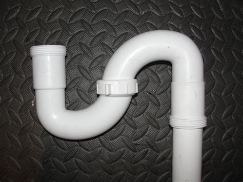 When installing a new shower pan and accompanying oatey drain we noticed the main drain pipe was slightly offset from where the shower pan hole was. A Primer on "S" Traps