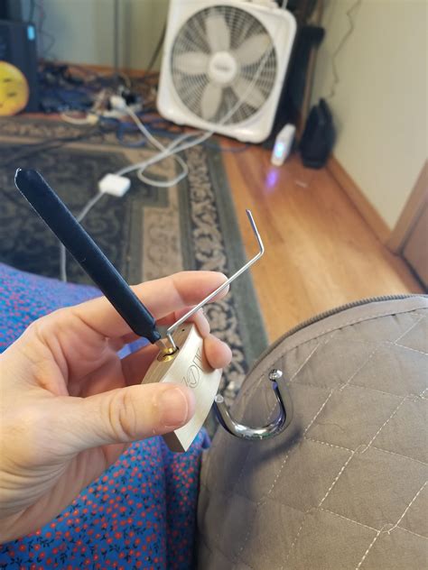 How to pick a lock with a knife. Finally got my first pick on a lock with security pins. Nasty spool. : lockpicking