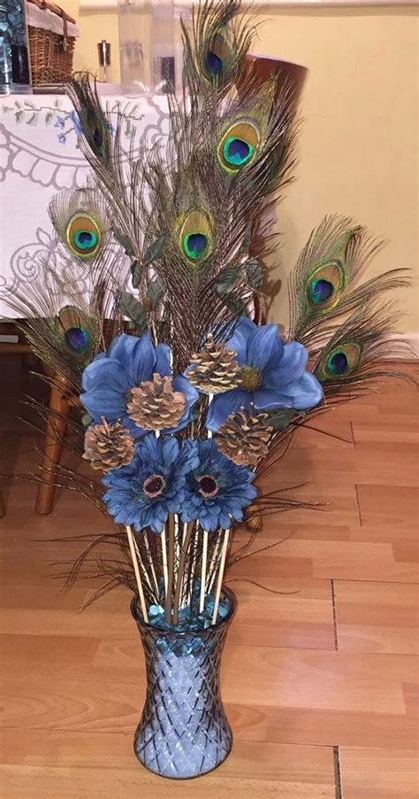 We love poring over the concepts and arrangement ideas our customers send us to conceive a brand new design for your needs. Wedding Peacock arrangement | Dried flowers, Hanukkah ...