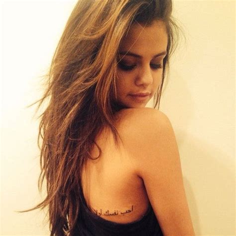 Selena gomez has a short, arabic tattoo on her back, under her right shoulder. 133 Most Popular Arabic Tattoos