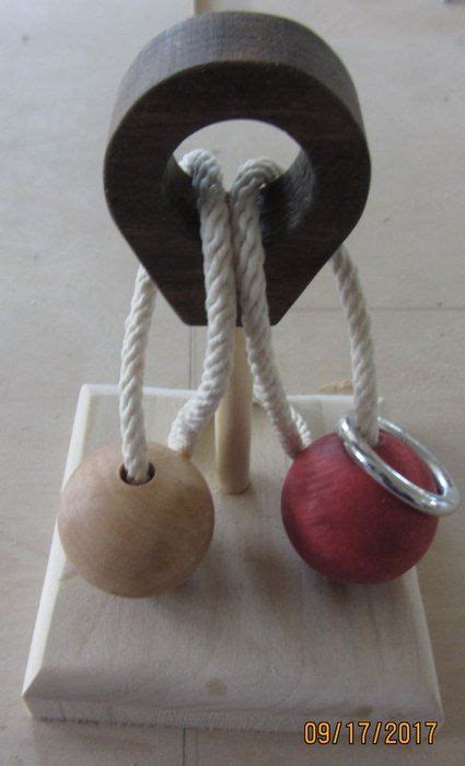 High quality at low price. Wood Ball - Metal Ring Rope Puzzle | Metal rings, Metal, Ball