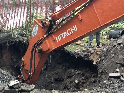 He could even move the spoil away from the working. digging foundation - Forshaw Group