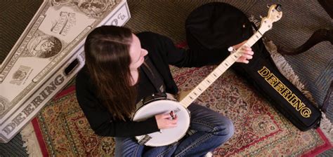 The painting shows an elderly black man teaching a boy, assumed to be his grandson, how to play the banjo. 4 Great Ways To Learn To Play the Banjo