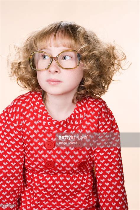 Portrait Of A Geeky Girl High-Res Stock Photo - Getty Images