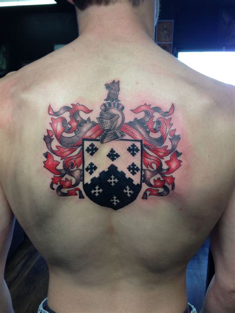 This is an example of the amount of work that goes into creating a custom tattoo design. Family crest on back by Justin Martin, Psychward Tattoos ...