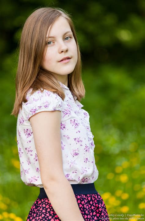 Facial expressions concept, yellow background. Photo of a 12-year-old Roman-Catholic girl photographed in ...