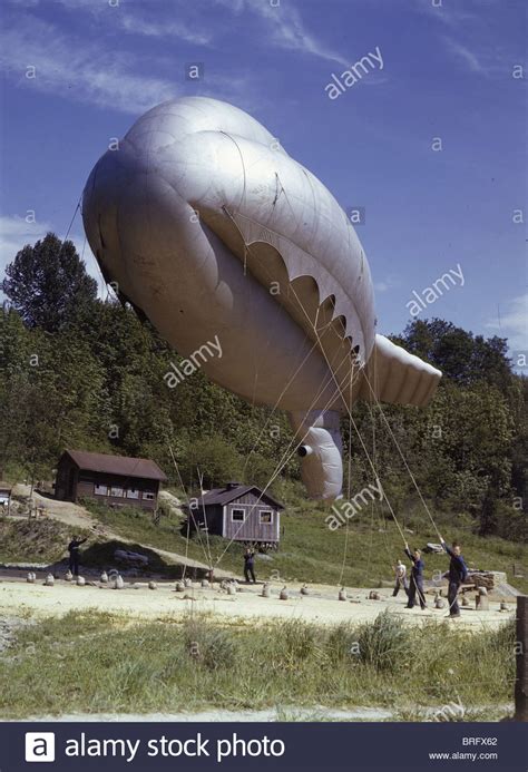 See more ideas about balloon art, star wars balloons, balloon animals. Men hold down a military barrage balloon during World War ...