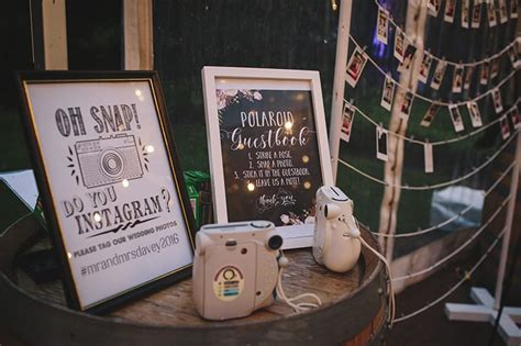 The polaroid guestbook was a big hit at the wedding. Emily & Josh's Pretty Pink & Navy City Wedding