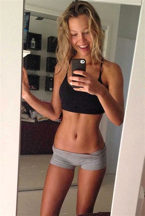 Skinny blonde fingering in a bra panties and boots. Just a shadow of her former selfie: Teen turns her back on ...