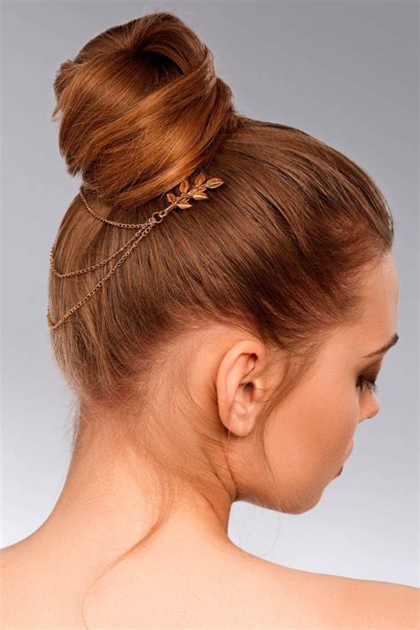 Put the right half to the left and then wrap it around the bun, and fix it in place with hair pins. Discover Useful Tutorials On How To Put Your Hair In A Bun