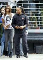 Retired footballer edgar davids relaxes at his miami hotel with his fiancée olcay gulsen. Reni van Maren