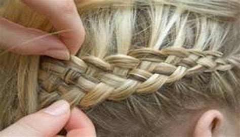 To start a french braid, separate your hair into sections. How To French Braid Your Own Hair - DIY Projects for Teens