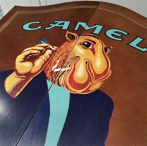 Joe camel, cartoon character that became focus of perhaps most intense attacks ever levied against an american advertising campaign, is being dropped by r j reynolds ''not having joe camel will hurt because he was a distinctive character that was a factor in the resurgence of camel,'' he added. Vintage Joe Camel Cigarettes DartBoard & Wooden Cabinet ...